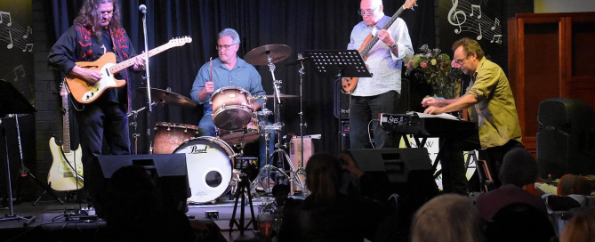 Craig Claxton and his fabulous rhythm section ... sometimes known as The Barbarians at the Azure Blue Album preview. L-R Craig Claxton (guitar & vox), John Postlethwaite (dums), Kevin Howard (bass), Brendan St Ledger (keyboards).